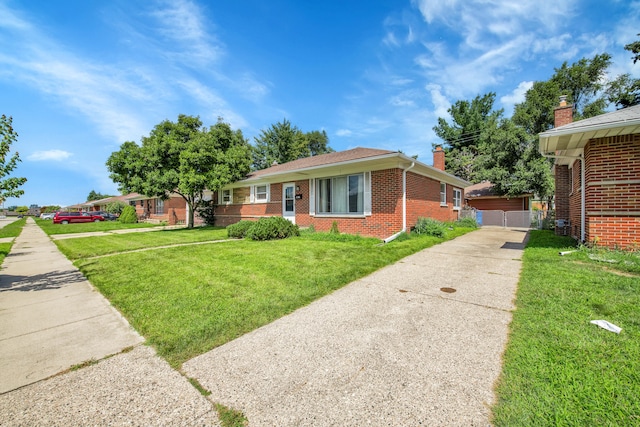 ranch-style home with a front yard