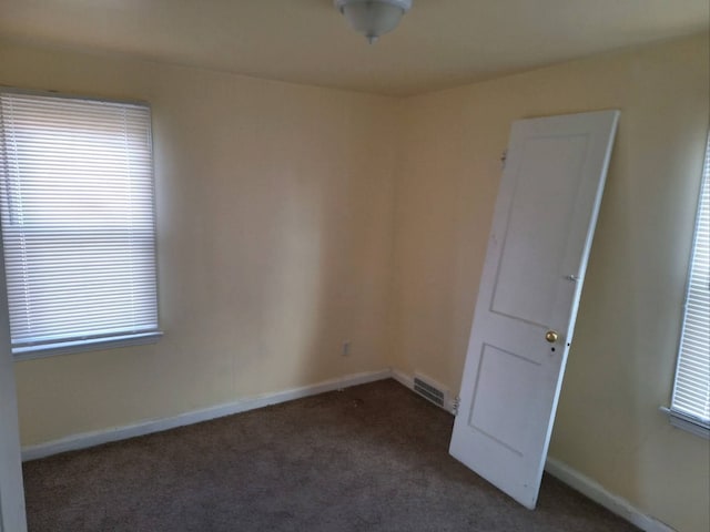 view of carpeted spare room