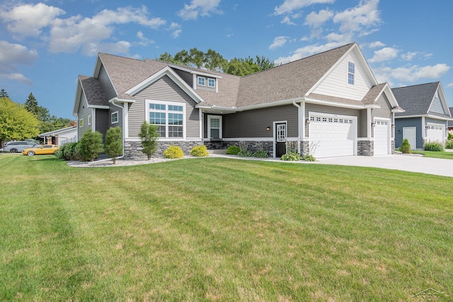 craftsman-style home with a garage and a front yard