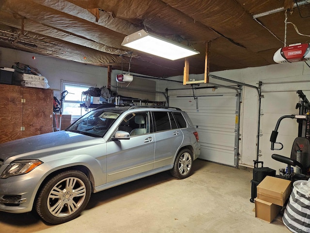 garage featuring a garage door opener