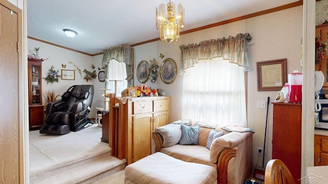 sitting room featuring light colored carpet, crown molding, and an inviting chandelier