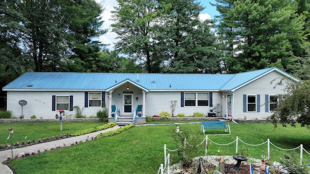 ranch-style home with a front lawn