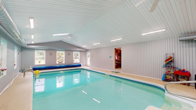 view of swimming pool featuring ceiling fan