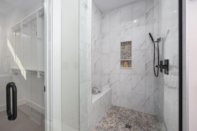 bathroom featuring an enclosed shower