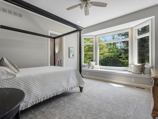 carpeted bedroom with ceiling fan