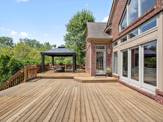 wooden terrace with a gazebo