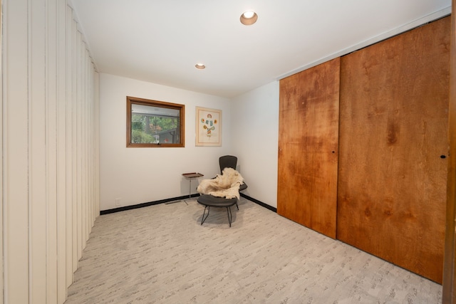 unfurnished room with light hardwood / wood-style floors