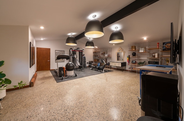 exercise area with vaulted ceiling