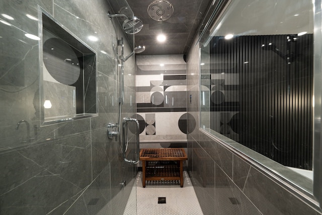 bathroom with a shower with shower door