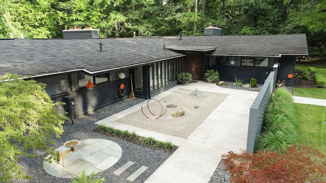 view of front of home featuring a patio area