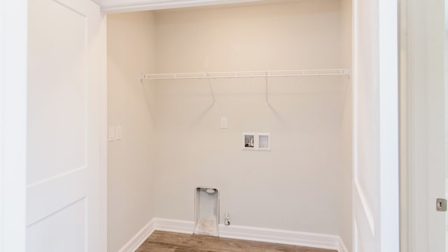 washroom featuring washer hookup and hardwood / wood-style flooring