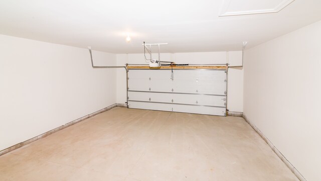 4322 Lincoln St, Detroit, MI 48208 - garage with a garage door opener and baseboards