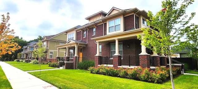 exterior space with a front lawn and a porch