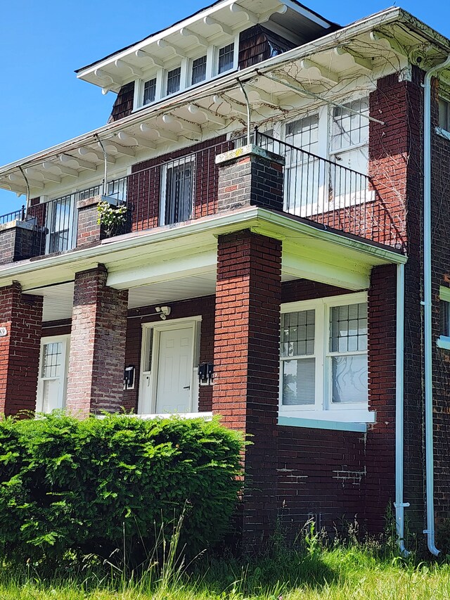 9369 Genessee, Detroit, MI 48206 - view of front of home featuring a balcony and brick siding