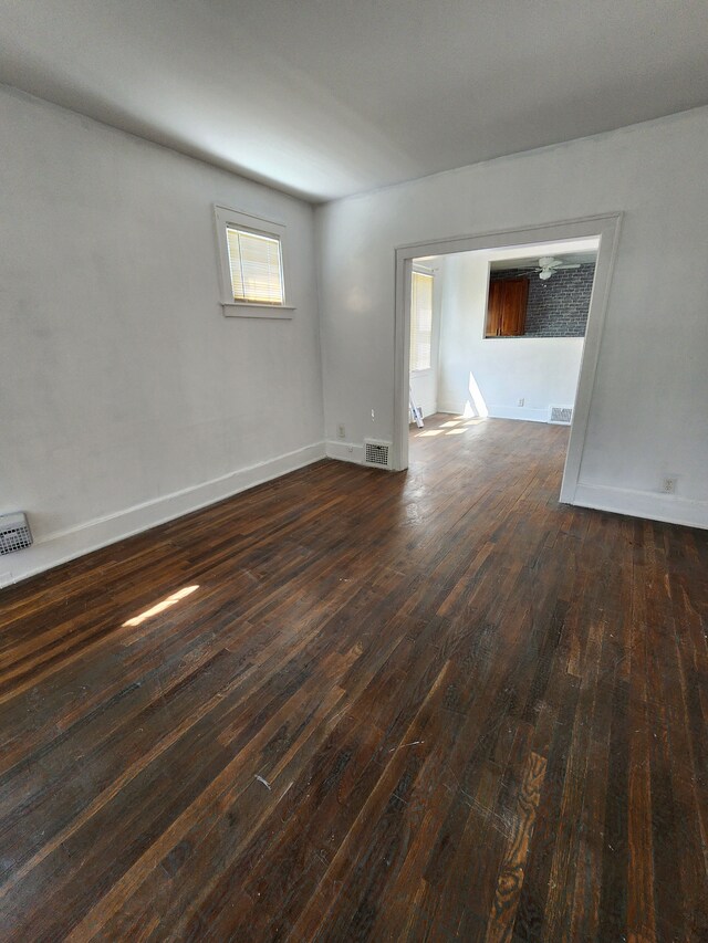 9369 Genessee, Detroit, MI 48206 - empty room with dark wood-style floors and baseboards