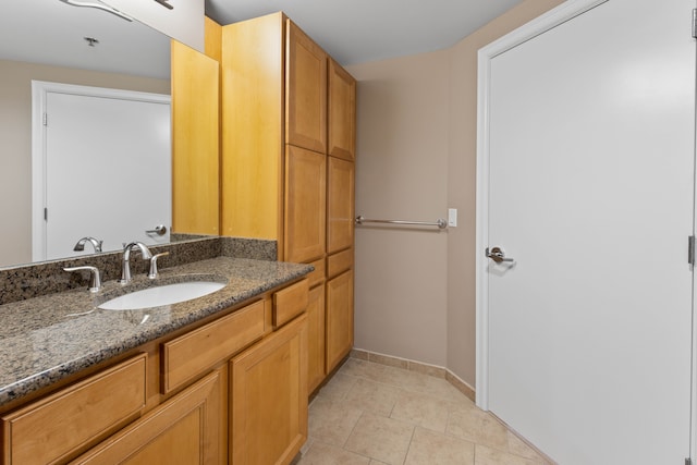 bathroom featuring vanity and tile patterned flooring