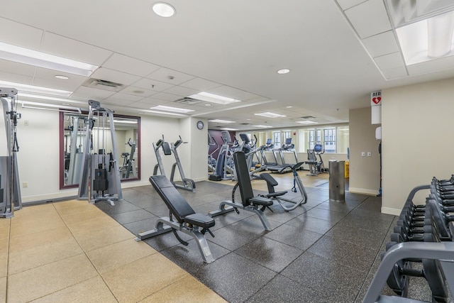 workout area featuring a drop ceiling