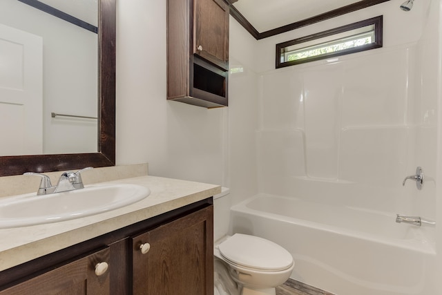 full bathroom featuring vanity, toilet, shower / bath combination, and crown molding