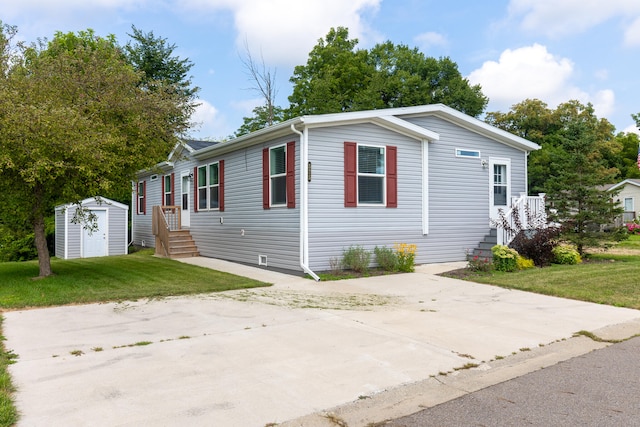 575 Gallery Dr Unit 48, Eaton Rapids, MI 48827 - manufactured / mobile home with a front yard