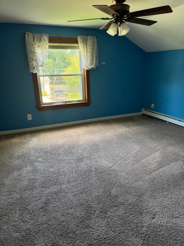 spare room with baseboard heating, ceiling fan, carpet, and lofted ceiling