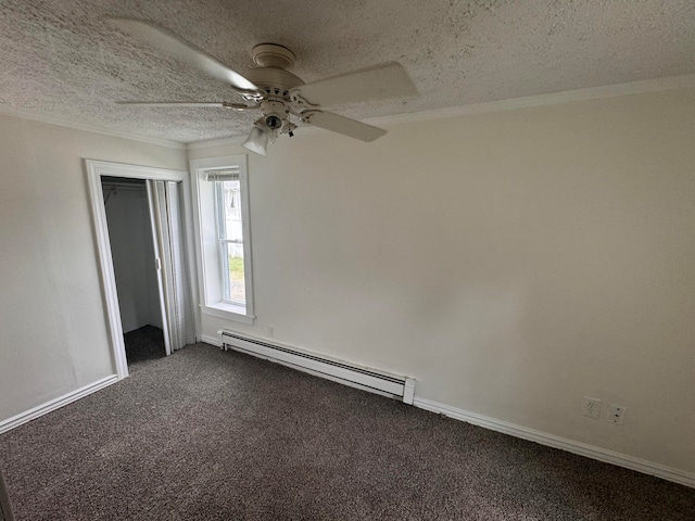 unfurnished bedroom with a baseboard heating unit, ceiling fan, a textured ceiling, carpet floors, and a closet