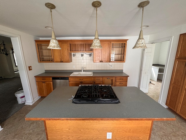 kitchen with sink, a center island, black gas cooktop, stainless steel dishwasher, and decorative backsplash