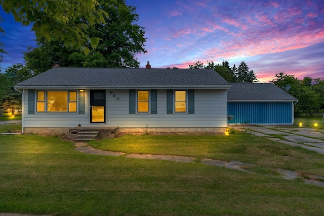 view of front of house with a lawn