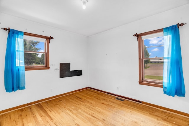 empty room featuring hardwood / wood-style floors