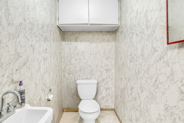 bathroom with toilet and sink