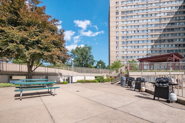 surrounding community with a patio