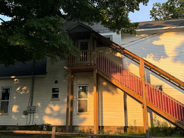 view of home's exterior featuring a balcony