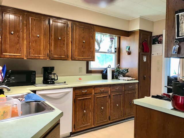 kitchen with dishwasher and sink