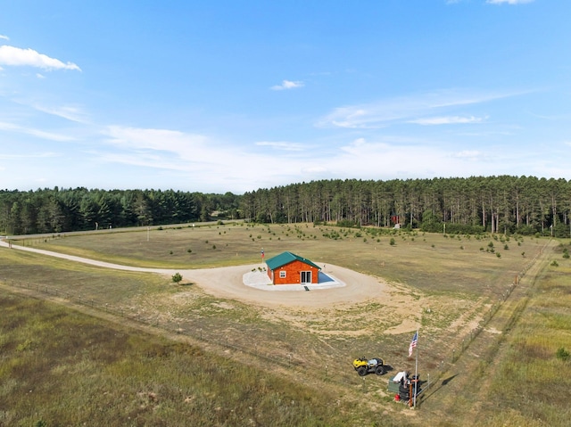 birds eye view of property with a rural view