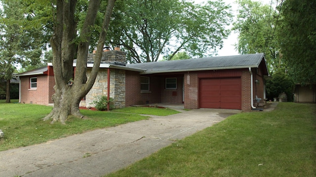 single story home with brick siding, a chimney, an attached garage, and a front yard