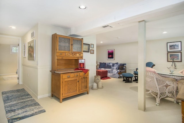 5925 Jagger Rd, Ludington, MI 49431 - dining room featuring light colored carpet and recessed lighting