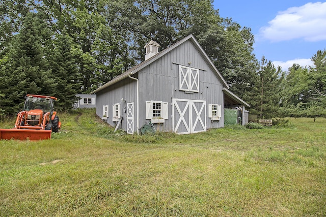 5925 Jagger Rd, Ludington, MI 49431 - view of barn featuring a lawn