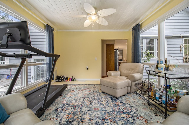 5925 Jagger Rd, Ludington, MI 49431 - living area featuring healthy amount of natural light, ornamental molding, ceiling fan, and wood ceiling