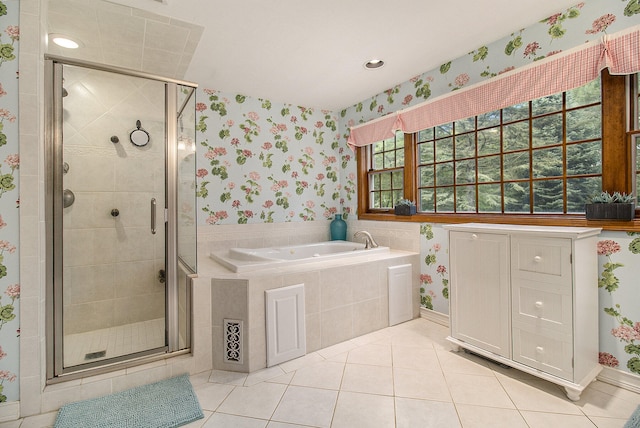 5925 Jagger Rd, Ludington, MI 49431 - bathroom with wallpapered walls, a bath, tile patterned flooring, a shower stall, and recessed lighting
