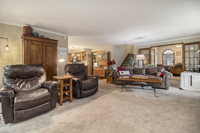 5925 Jagger Rd, Ludington, MI 49431 - living area with light carpet, crown molding, and stairway