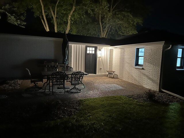 view of patio at night