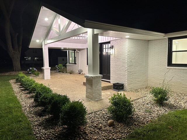 view of patio at twilight