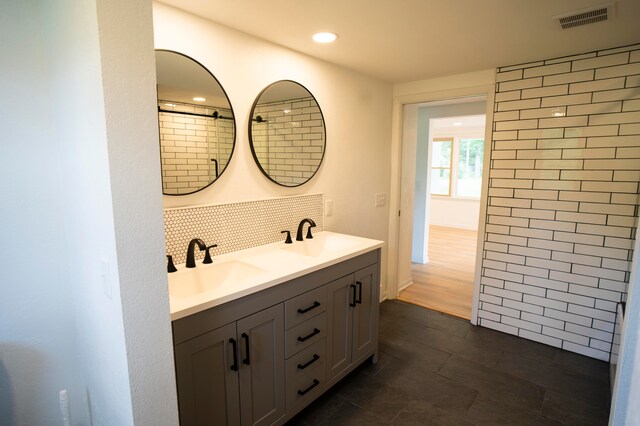 bathroom featuring hardwood / wood-style floors and vanity