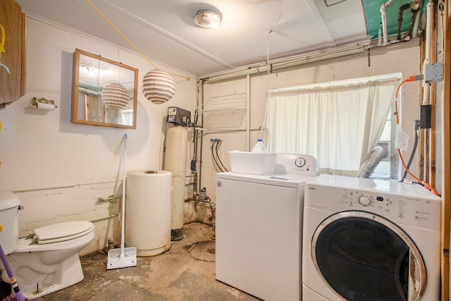 washroom featuring separate washer and dryer