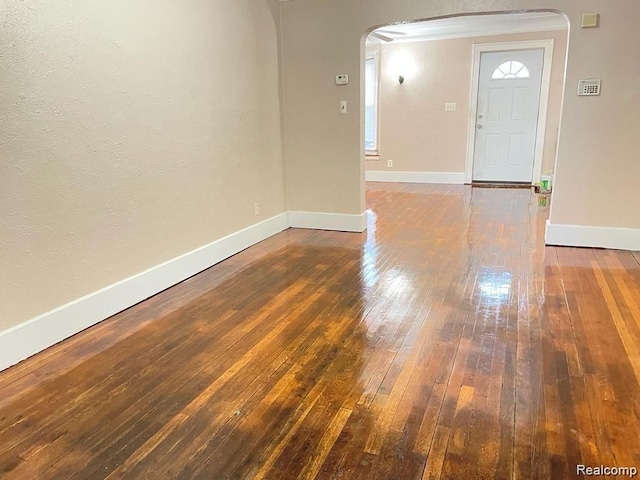 foyer featuring dark hardwood / wood-style floors