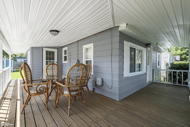 1029 Boatfield Ave, Flint, MI 48507 - wooden deck with outdoor dining space