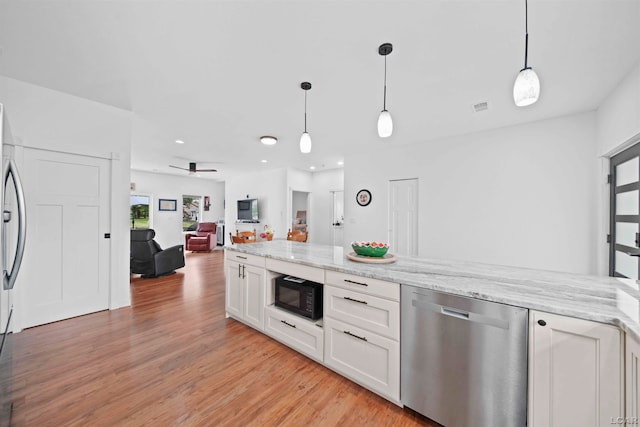 kitchen featuring stainless steel appliances, ceiling fan, pendant lighting, light hardwood / wood-style flooring, and white cabinetry