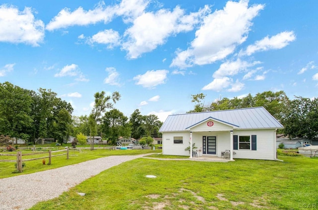 view of front of house with a front lawn and a porch