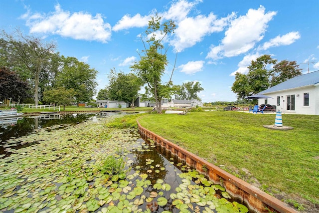 view of yard featuring a water view