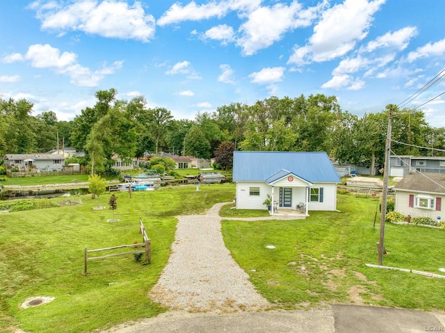 ranch-style house featuring a front yard