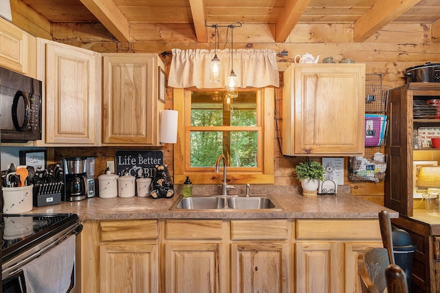 kitchen with sink, light brown cabinets, hanging light fixtures, beamed ceiling, and wooden walls